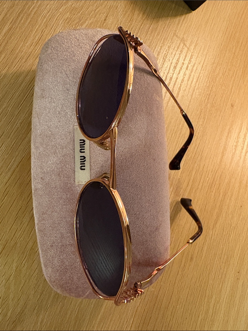 Miu Miu Rose Gold Metal Frame Sunglasses with Purple/Grey Lenses